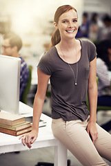 Image showing Smile, office and portrait of woman by desk with pride, confidence and happiness for small business. Face, graphic designer and leaning on table with creative, job and research project at workplace