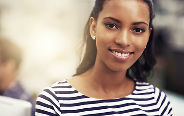 Image showing African employee, portrait and smile with closeup, desk and business and company or workspace. Woman, startup and office with entrepreneur, face and happiness with work and career at design agency