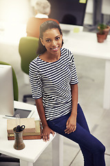 Image showing African woman, portrait and smile with coworking, desk and business and company or workspace. Employee, startup and office with entrepreneur, face and happiness with work and career at design agency