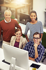 Image showing Diverse group, coworker and smile with computer at office for teamwork, strategy and planning for work. From above, happy and satisfied with collaboration as group for project in startup business.