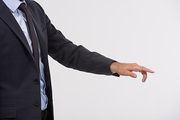 Image showing Businessman, studio and hand pointing with interface for touch, UX or UI on a gray background. Closeup of young man, user or employee with interaction for virtual technology, push or click on mockup