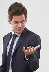 Image showing Businessman, palm and hand with interaction for virtual display or hologram on a white studio background. Isolated young man, user or business employee showing gesture sign, symbol or 3D technology