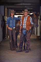 Image showing Portrait, horse and couple in stable at farm in rural countryside for animal care in Texas. Smile, confident and full body of young man and woman with cowboy hats for fashion with stallion on ranch.