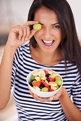 Image showing Playful, woman and fruit salad with smile, natural nutrition and healthy organic food. Happy, female person with snack with vitamins for skin and body wellness, balance diet and excited vegan choice