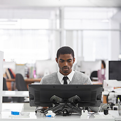 Image showing Black man, technology and worker with computer at workplace, office and professional at desk for creative career. African male person, graphic designer or illustrator working on designs on 3D printer