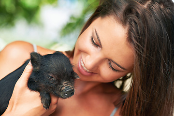 Image showing Woman, pig and happiness for volunteer, charity organization and rescue center. Welfare, smile and female person with piglet for foster care, adoption and animal sanctuary for nonprofit or ngo