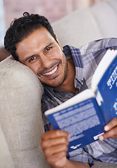 Image showing Man, portrait and reading a book for knowledge in home, literature and information. Happy male person, story and fiction novel for education in living room on weekend, comfortable and relax on sofa