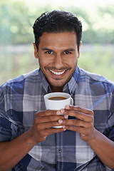 Image showing Man, portrait and coffee to relax in home, smile and satisfaction with hot beverage on weekend. Male person, happy and latte or comfortable in apartment, morning and routine cup of tea for peace