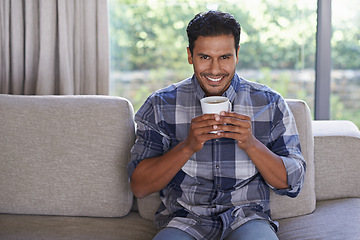 Image showing Man, portrait and tea to relax in home, smile and satisfaction with hot beverage on weekend. Male person, happy and latte or comfortable in apartment, morning and routine cup of caffeine for peace