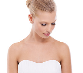 Image showing Fashion, makeup and woman in wedding dress in studio with beauty, stylish and elegant facial routine. Cosmetic, classy and young female person in bridal gown and cosmetology face by white background.