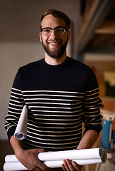 Image showing Portrait, architect and man with blueprint, construction and employee in a workshop with planning for property development. Face, entrepreneur and engineer with documents and renovation with startup