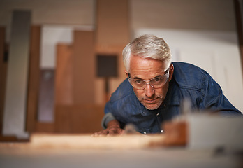 Image showing Carpenter, thinking and planning in workshop, safety and glasses in small business. Design, woodwork or production with lumber or timber, contractor and materials or tools for furniture building