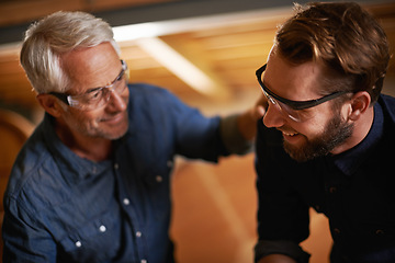 Image showing Support, father and son in a workshop, architect and family with renovation and safety glasses. Parent, men and teamwork with construction job and building with planning for project and cooperation