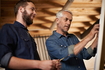 Image showing Planning, brainstorming and architects by board in workshop for industrial carpentry project. Discussion, engineering and male industry apprentice working on ideas with mentor in office on site.