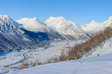 Image showing Winter wonderland in a snow-covered mountain valley at daytime