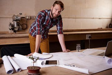 Image showing Man, portrait and architect with blueprint for engineering or construction, renovation and design for building. Floor plan, sketch and property development with architecture paperwork in workshop