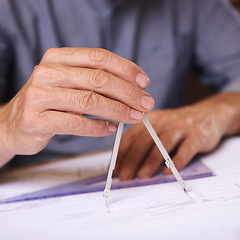 Image showing Hand, closeup of compass and architect drawing blueprint, construction and civil engineering with stationery. Drawing tools, equipment and person with floor plan for property or renovation project