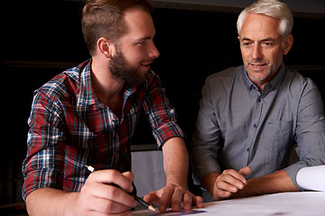 Image showing Architect, team and men with blueprint, drawing or planning construction project with father teaching son. Engineer, apprentice and senior mentor with design, pencil or measure with ruler at workshop