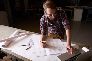 Image showing Man, architect and laptop or blueprint, working and planning for construction. Architecture, building and engineering for infrastructure, design and contractor on technology for remodel research