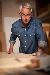 Image showing Carpenter, thinking and planning in workshop, design and contractor in small business. Furniture, woodwork and production table with clamp for lumber or timber, safety glasses and materials or tools