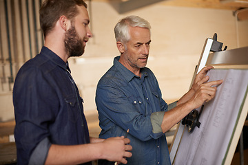 Image showing Carpenter, team and men with blueprint for construction, planning project and creative. Architecture, apprentice and mentor with design, drawing and senior father with son for training at workshop