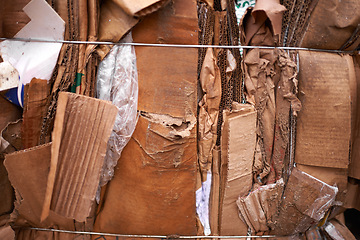 Image showing Recycle, cardboard or box of trash in outdoor for waste management, junk yard garbage or rubbish. Community. background, organised closeup of dirty material with dump collection, litter or scrap pile