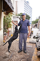 Image showing Man, dog and poor poverty in street, lower class and garbage or social economy. Smile, male person and friendly pet in alley with bad infrastructure city, third world or neighbourhood and pollution