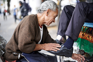 Image showing Shine, shoes or old man in street, city or cleaning service for client or customer with polish or trade. Cloth, senior or feet of businessman in downtown Sao Paulo for footwear, job or outdoor help