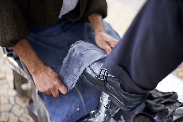 Image showing Shining, shoes or hands of man in street, city or cleaning service for client or customer with polish or trade. Cloth, closeup or feet of businessman in downtown for footwear, job or outdoor help