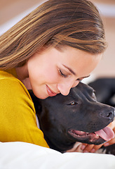 Image showing Smile, woman and dog on couch for relax, love and happiness together in living room. Female person, cuddle and puppy on sofa for affection, comfort and stress relief with domestic animal in apartment