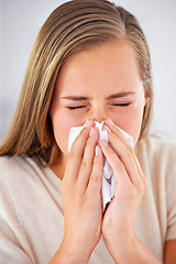 Image showing Woman, sneeze and sick with flu or allergies and blowing nose in tissue for healthcare and healing in home. Medical, burnout and care for virus infection or person with sinusitis in apartment