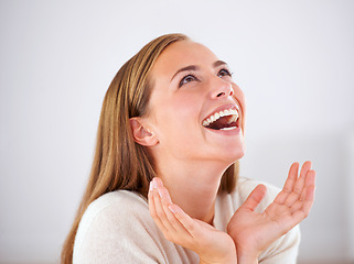 Image showing Laughing, woman and happiness in studio with funny, comedy or reaction to humor in white background. Crazy, joke and girl giggle with joy from thinking of moment in comic or person with a smile