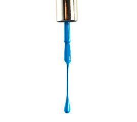 Image showing Nail polish, blue and drop drip in studio for manicure or pedicure, art or design and application for hands and feet. Closeup, cosmetic product and brush for color or coating for beauty and fashion.