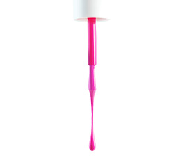 Image showing Nail polish, pink and drop drip in studio for manicure or pedicure, art or design and application for hands and feet. Closeup, cosmetic product and brush for color or coating for beauty and fashion.