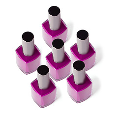 Image showing Nail polish, purple and bottle on a white background for beauty, cosmetics and salon products. Cosmetology, luxury spa and isolated container with paint for manicure, pedicure and pamper in studio