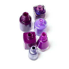 Image showing Nail polish, purple color and bottle on a white background for beauty, cosmetics and salon products. Cosmetology, luxury spa and isolated jar for painting for manicure, pedicure and pamper in studio