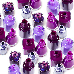 Image showing Nail polish, purple aesthetic and bottle on a white background for beauty, cosmetics and salon products. Cosmetology, luxury spa and isolated color for manicure, pedicure and pamper nails in studio