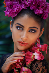 Image showing Jungle, portrait or Indian woman with flowers for beauty, natural cosmetics or wellness in nature aesthetic. Color, person or face of model with at eco friendly skincare, plants or spring floral art