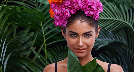 Image showing Leaf, portrait or woman with flowers for beauty, makeup and wellness in nature, rainforest or jungle. Crown, Indian person or face of model with eco friendly skincare, plants or spring floral art