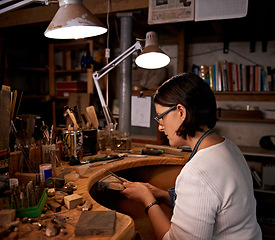 Image showing Artist, woman and tools with wood in workshop with craftsmanship, skill and handmade design with creativity. Woodwork, carpenter or creative person at workspace with equipment for handicraft or hobby