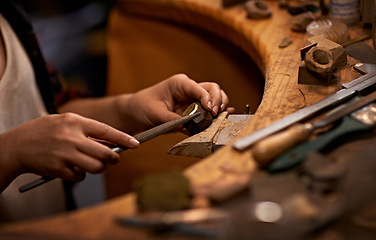 Image showing Woodworking, industrial and hands of woman in workshop for creative project or sculpture. Artisan, industry and closeup of female carpenter manufacturing products in studio for small business.