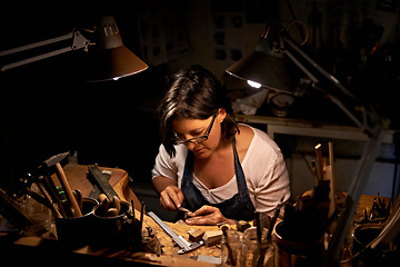 Image showing Artist, woman and tools with woodwork in workshop with craftsmanship, skill and handmade design with creativity. Wood, carpenter or creative person at workspace with equipment for handicraft or hobby