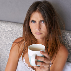 Image showing Angry, woman and portrait with coffee in bed, frustrated and warm beverage for mental health in home. Lady, face and upset in bedroom with espresso cup and morning energy for burnout in apartment