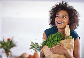 Image showing Smile, paper bag and young woman with groceries for dinner, lunch or supper at home. Happy, food and female person with fresh, organic or nutrition ingredients for healthy diet at modern house.