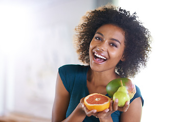 Image showing Happy, health and portrait of woman with fruit for fresh, organic or nutrition snack for diet. Smile, wellness and young female person with produce ingredients or groceries at modern apartment.