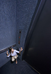 Image showing Business, person and fear of elevator with worry for trapped, claustrophobia or anxiety in emergency. Office, lift and woman scared for safety in space or nightmare panic attack from stress in crisis