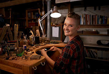 Image showing Portrait, woman and tools with woodwork in workshop with craftsmanship, happy and handmade design with creativity. Artist, wood and creative person at workspace with equipment for handicraft or hobby