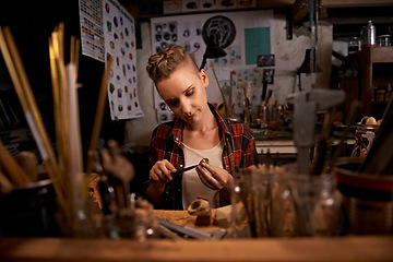 Image showing Artist, woman and tools with woodwork in workshop with craftsmanship, knife and handmade design with creativity. Wood, carpenter or creative person at workspace with equipment for handicraft or hobby