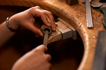 Image showing Carpentry, industry and hands of woman in workshop for creative project or sculpture. Artisan, industrial and closeup of female person manufacturing products in studio for woodworking small business.