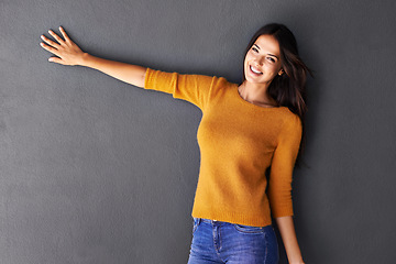 Image showing Happy, portrait and woman with hand on studio space for announcement, offer or news info on black background. Mockup, face and female model show deal announcement, review, feedback or deal promotion